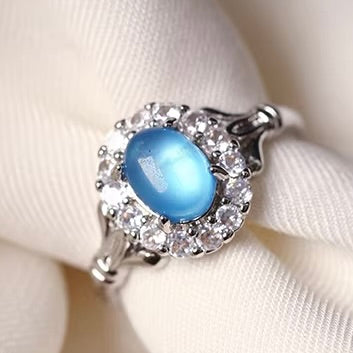 925 Sterling Silver ring with a blue aquamarine gemstone on a white background