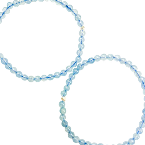 Aquamarine beaded bracelet 4mm with elastic stretching cord, displayed on a white background