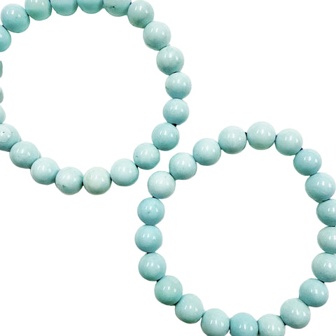 Light blue howlite 8mm beaded necklace on a white background