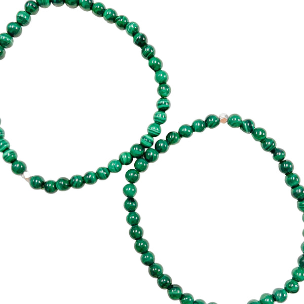 A green Malachite beaded bracelet with a length of approximately 16cm, featuring elastic stretching cord.