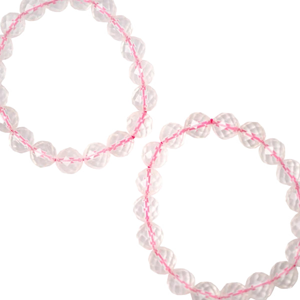 Two faceted rose quartz bracelets with pink cord on a white background