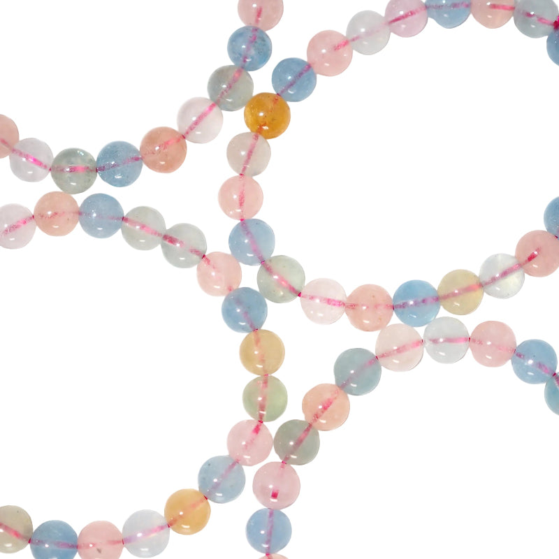 A multicolored morganite beaded bracelet with a combination of pink, blue, and green colors, featuring a heart chakra design.