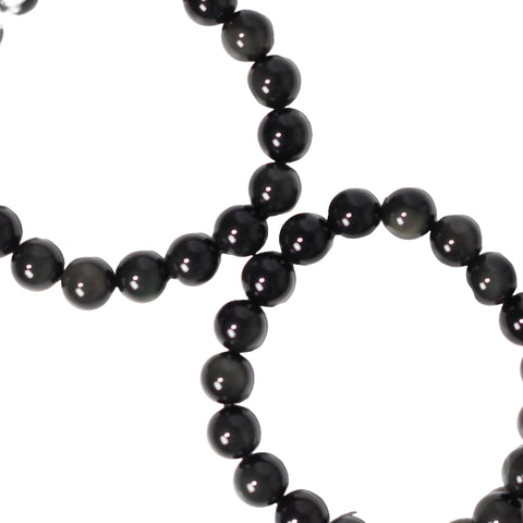 A black rainbow obsidian beaded bracelet with a smooth, glossy finish.