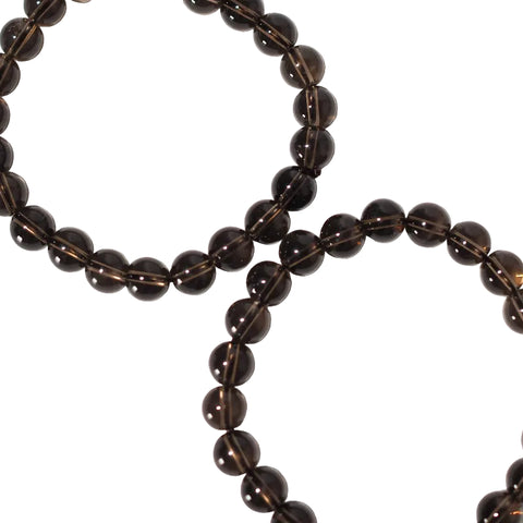 A smoky quartz bead bracelet with elastic stretching cord, approximately 16cm in length.